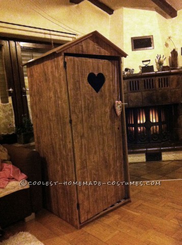 Funny Illusion Costume: Traditional Bavarian Woman Sitting on Wooden Toilet