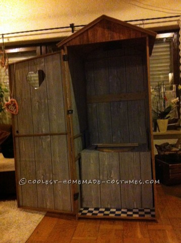 Funny Illusion Costume: Traditional Bavarian Woman Sitting on Wooden Toilet