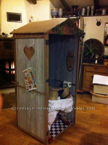 Funny Illusion Costume: Traditional Bavarian Woman Sitting on Wooden Toilet