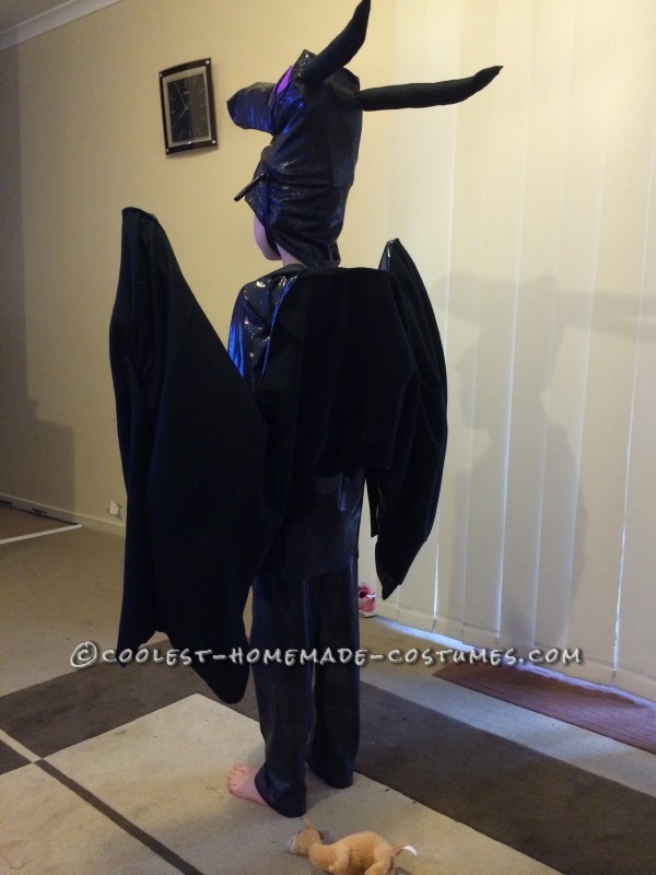 The wings folded up from behind - the back was plain black felt, but the inside of the wings was an iridescent black dance fabric, different to what I used on the costume body.