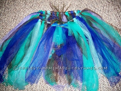 Tulle tutu with feather brooch attached