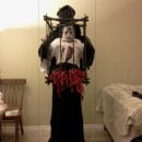 Grim Reaper with Half Zombie in a Cage Illusion Costume