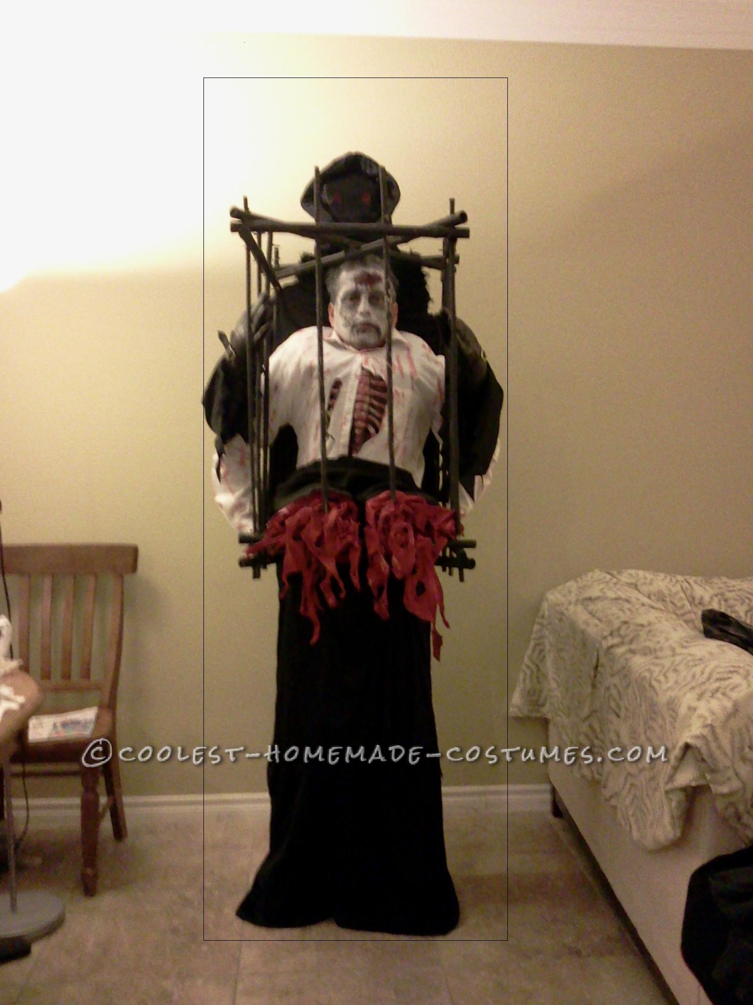 Grim Reaper with Half Zombie in a Cage Illusion Costume