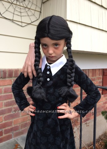 Cool Homemade Mom and Daughter Couple Costume: Morticia and Wednesday Addams with Thing