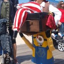 Optical Illusion Costume: A Minion Carrying a Pirate in a Treasure Chest