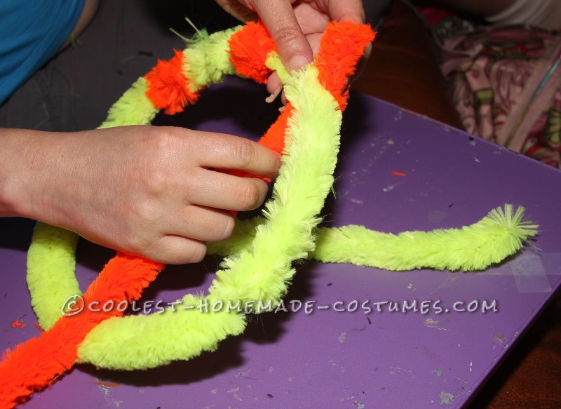 Twisting Chenille Stems for Magnifying Glass