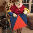 Scary Clown Carrying A Jack In The Box Illusion Costume