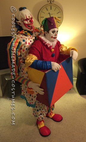 Scary Clown Carrying A Jack In The Box Illusion Costume