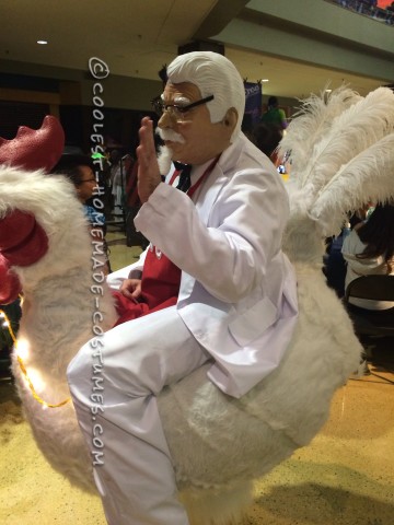 Coolest Colonel Sanders Costume Riding a Giant Chicken!