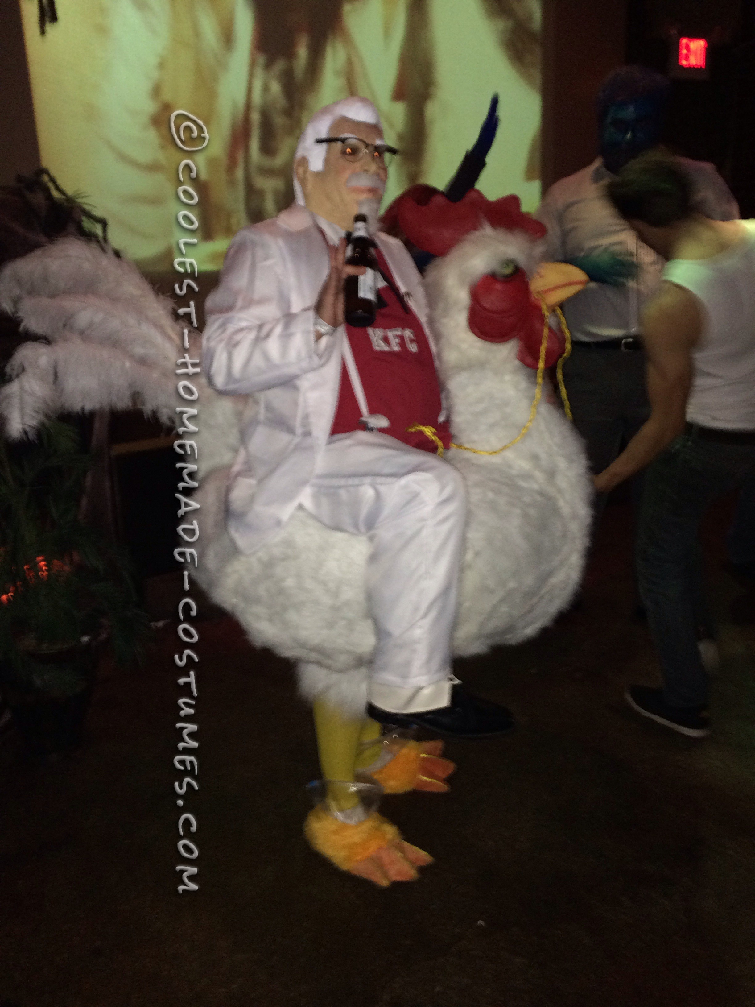 Coolest Colonel Sanders Costume Riding a Giant Chicken!