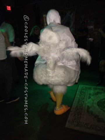 Coolest Colonel Sanders Costume Riding a Giant Chicken!