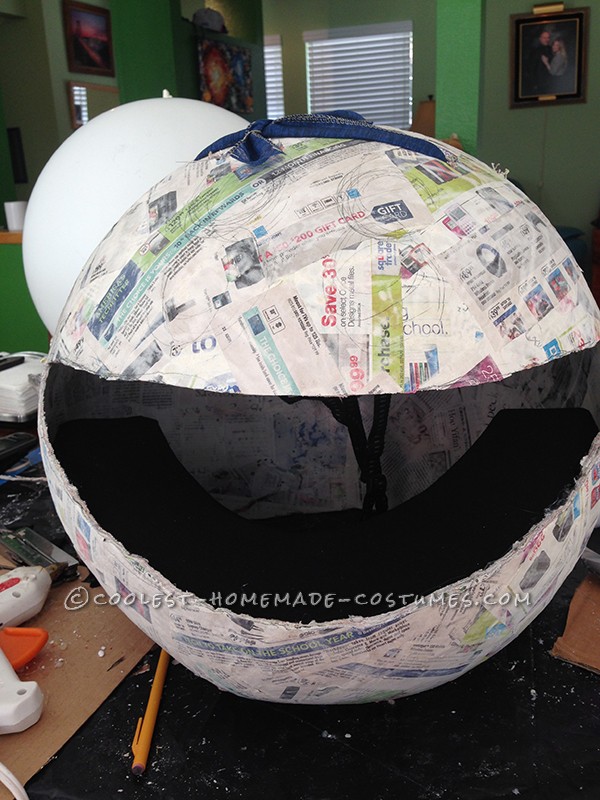 2nd Step:  Cutting the mouth and neck opening and installing a helmet.