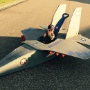 Top Gun Baby Pilot Costume with an F-14 Tomcat Jet Plane
