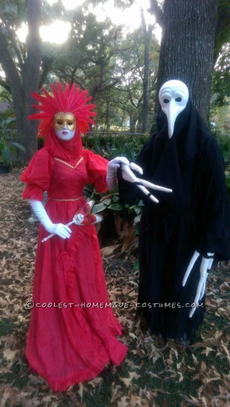 the bird masked creature and his lady