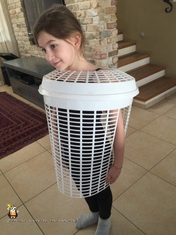 Cutting Holes for the Arms in the Laundry Basket Popcorn Costume