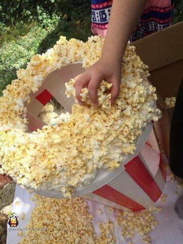 Adding the final nuggets of corn to the Popcorn costume