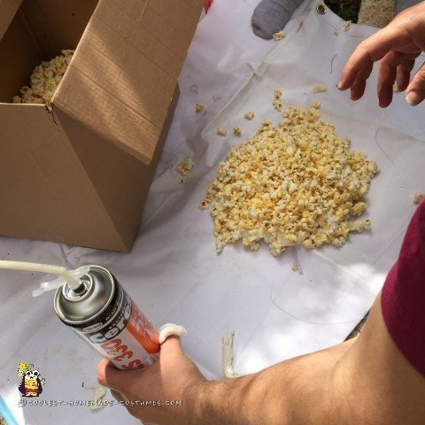 Popcorn costume headpiece covered in foam and popcorn