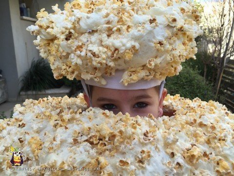 Peeking out of the Popcorn Costume