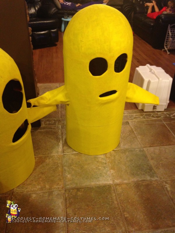 Minion Costumes covered in yellow felt with felt sleeves attached