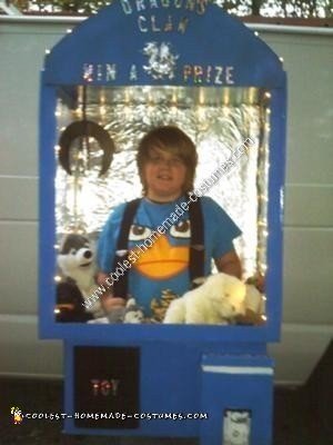 Homemade Kid in a Claw Machine Halloween Costume Idea