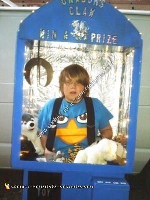 Homemade Kid in a Claw Machine Halloween Costume Idea