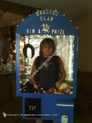 Homemade Kid in a Claw Machine Halloween Costume Idea